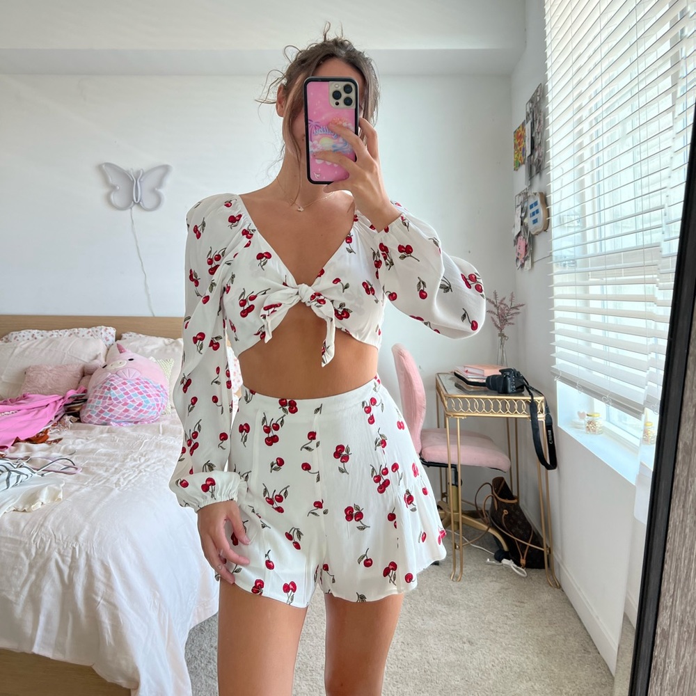 Two piece cherry short set long sleeve crop top 
Cotton Candy La
Rave festival